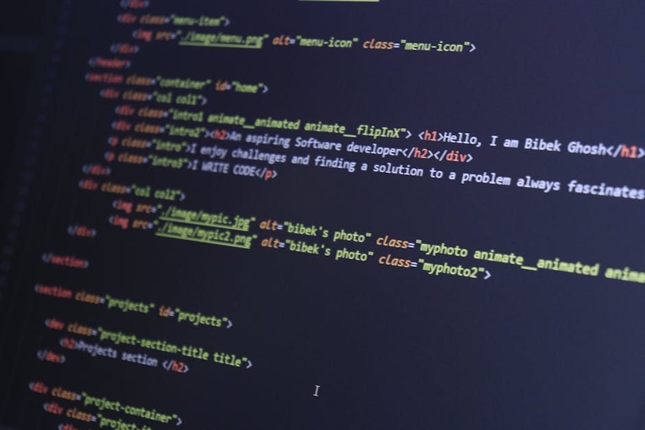 A close-up view of a computer screen displaying lines of HTML code in multiple colors, including tags, attributes, and links. The code features headings, image links with alt text attributes, and nest